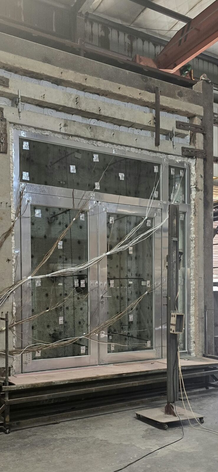 JT glass doorset mounted in a fire-test furnace before the test